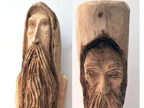 dwie rzeźby przedstawiające mężczyzn z dugą brodą.