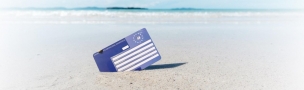 karta ubezpieczeniowa widnieje na piaszczystej plazy w 