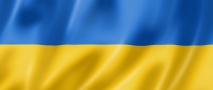 Flaga Ukrainy podzielona na dwa równe poziome pasy. Na górzy niebieski, na dole żółty.