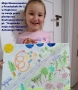 Maja Niemcunowicz z Przedszkola Nr 2 w Hajnówce ze swoją pracą plastyczną ilustrującą wiersz pt. "Hajnówka - moja mała Ojczyzna" Antoniego Fibika