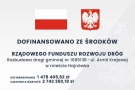 tablica informacyjna projektu: u góry obok siebie flaga Polski i godło, pod nimi informacje o projekcie: nazwa, źródło dofinansowania, kwoty