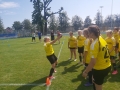Rzut piłką lekarską przez Estonke na stadionie OSiR