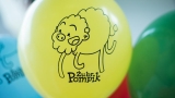 Żółty balon z logo Żubra Pompika