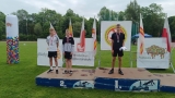 laureaci na podium